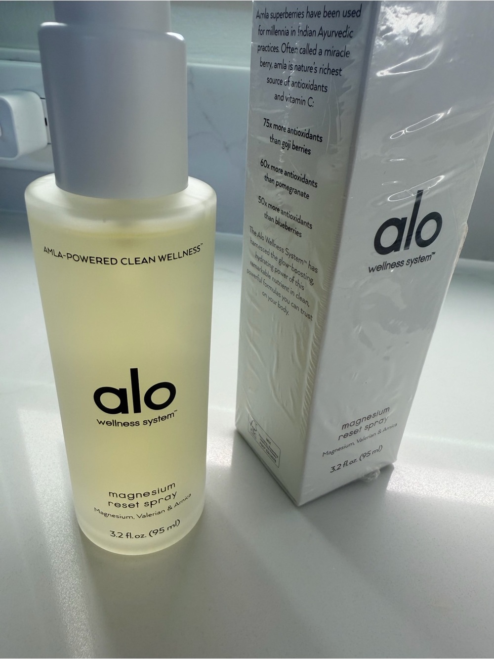 ALO Yoga Magnesium Reset Spray in pale yellow